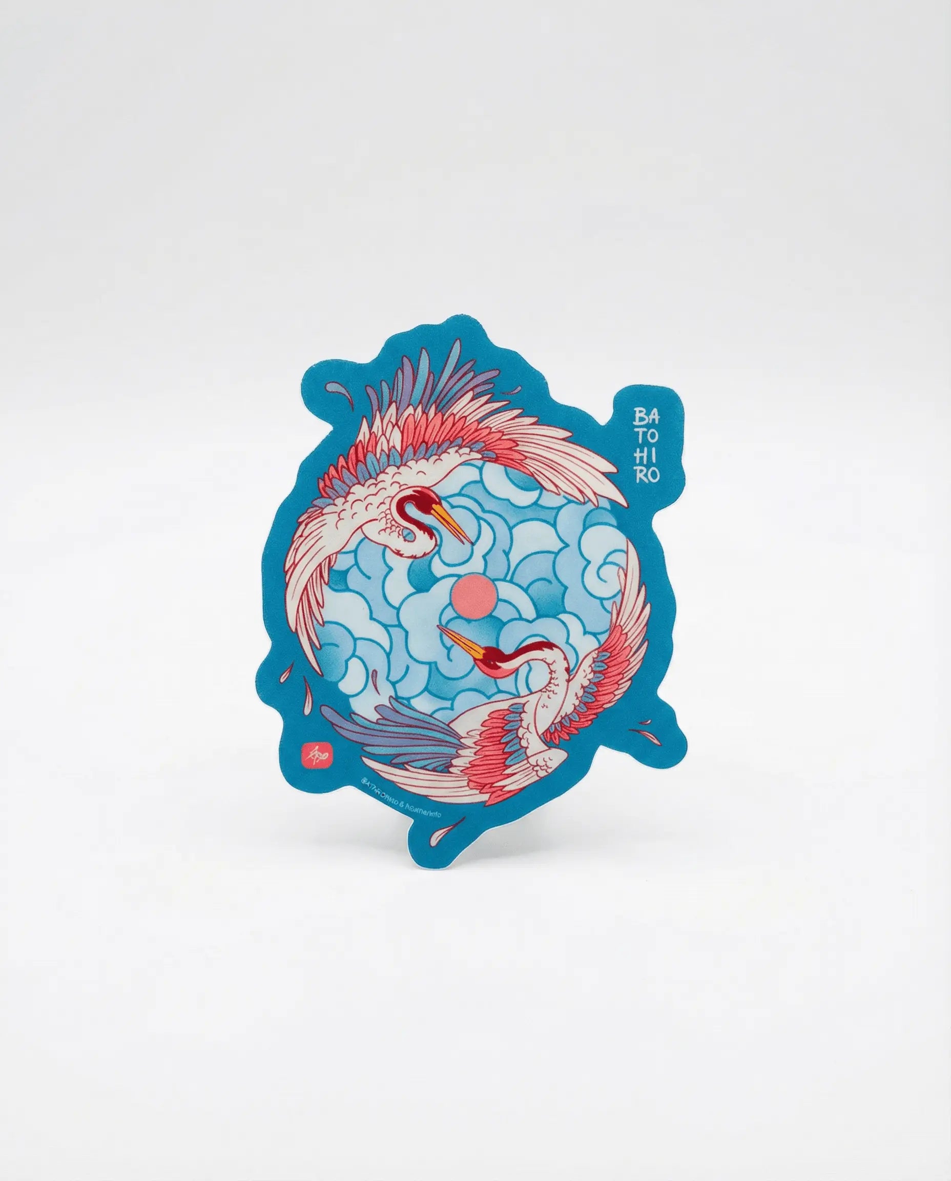 Batohiro® Crane Sticker featuring a vibrant design of cranes against blue clouds, perfect for personalizing notebooks and devices.