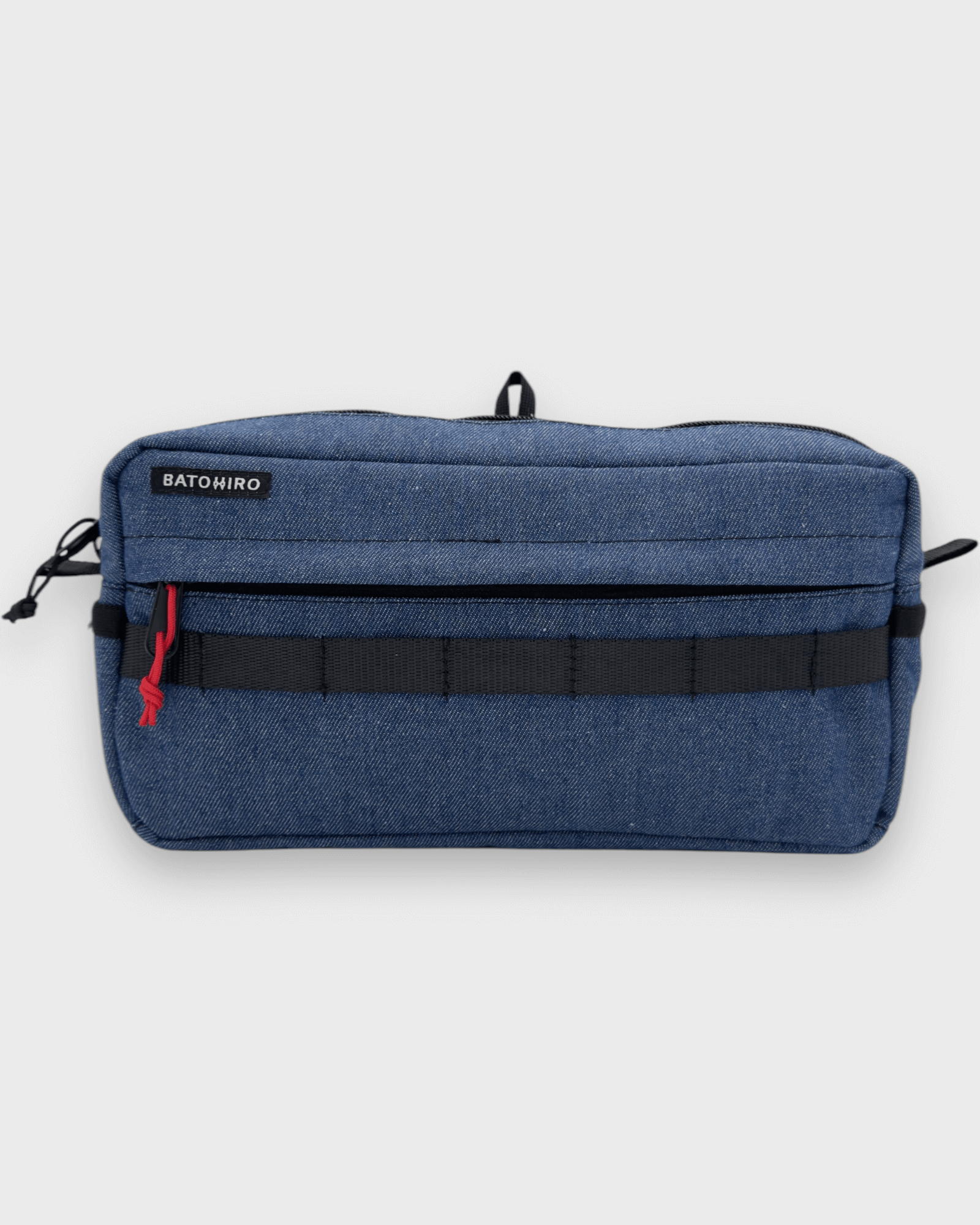 Stylish blue denim travel bag with adjustable strap and multiple pockets for versatile use.